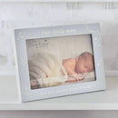 Gray photo frame with a baby picture and text on a white background