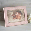 Pink photo frame with a baby picture and text 'Our little princess' on a white background