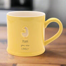 Yellow mug with a duck illustration and text on a white background