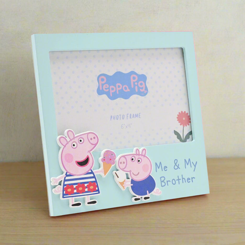 Peppa Pig photo frame with characters and text on a light blue background
